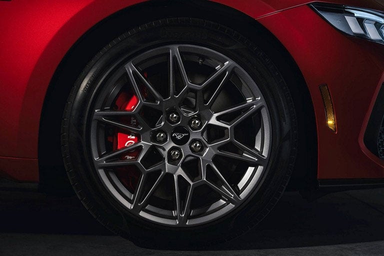 2024 Ford Mustang® model with a close-up of a wheel and brake caliper | Jim Hudson Ford in Lexington SC